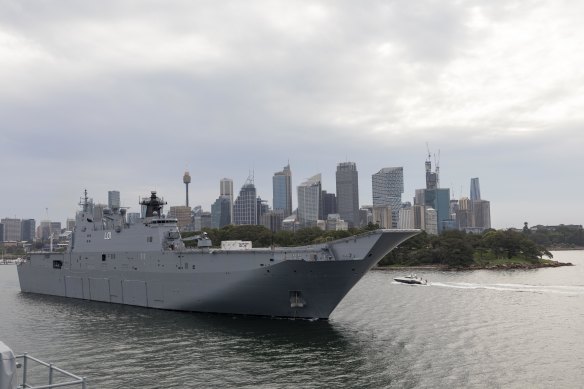 HMAS Adelaide on its way to Brisbane to be loaded with emergency supplies to take to Tonga.