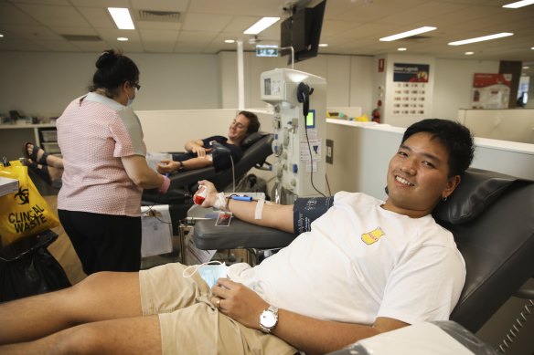 Parvit Kulsiithana gives blood at the Town Hall Lifeblood clinic in Sydney on Monday.