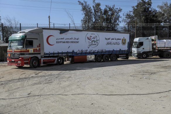 Aid and diesel trucks enter the Gaza Strip at the Rafah land crossing. 