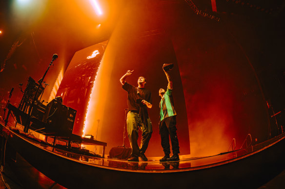 Fred again..: Gibson alongside his brother Tony on the Rod Laver Arena stage.