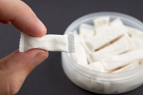 Snusing involves wedging a pouch of tobacco into the upper lip.