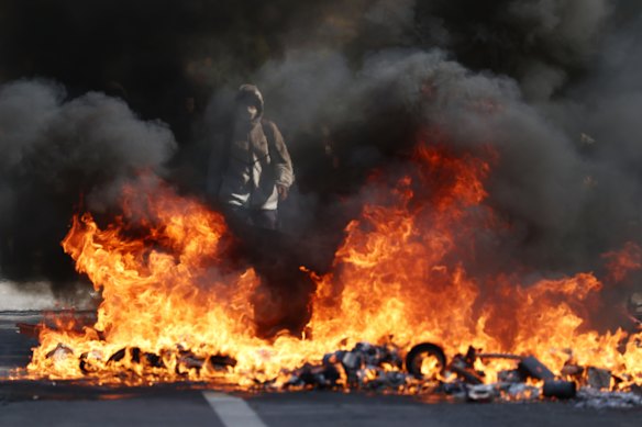 French students set fires as they clash with police in Aubervilliers last week.