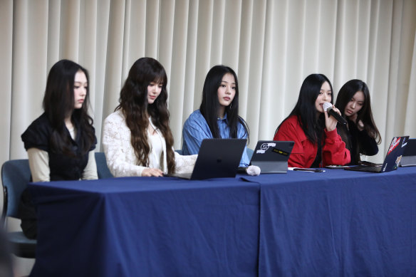 From left: Haerin, Danielle, Minji, Hanni and Hyein of girl group NewJeans hold a press conference in November after announcing the termination of their contract with their Ador.
