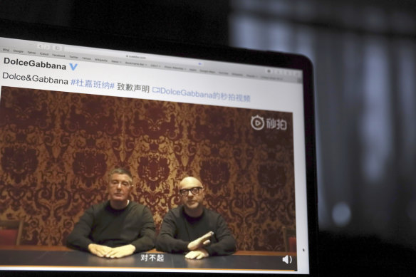 The founders of Dolce&Gabbana Domenico Dolce, left and Stefano Gabbana apologise in a video on Chinese social media in 2018, saying “sorry” in Mandarin seen on a computer screen in Beijing, China. 