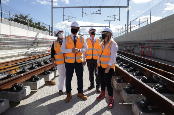 Premier Mark McGowan and Transport Minister Rita Saffioti (front) at the site of the new Perth to Bayswater airport link.