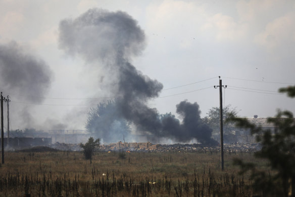 Smoke rises over the site of explosion at an ammunition storage of Russian army near the village of Mayskoye, Crimea.