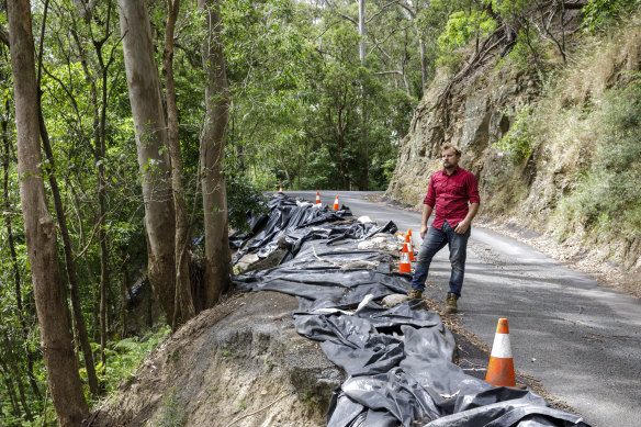 Amaroo Valley Springs owner Andy Cichanowksi inspects the damage on Bunkers Hill Road.