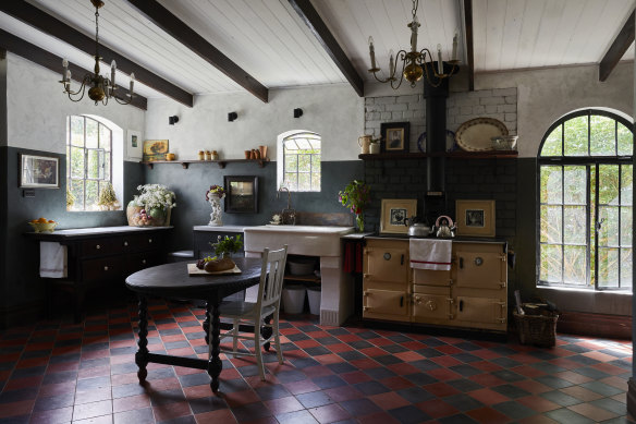 “The arched window [on the right] was worth waiting 18 months for it to arrive from eastern Europe,” says Pottage. “The floor tiles are from
Eco Tile Factory and the Rayburn stove is from an old pub near Colac.” She bought the ceramic sink on Facebook Marketplace.