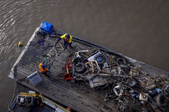 A pile of rubbish on a barge in the Yarra.