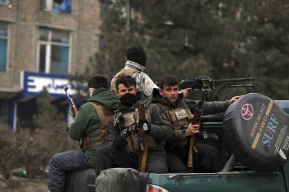 Afghan security personnel arrive at a Kabul bombsite on December 26, 2020. Journalists fear more targeted attacks during escalating violence.  