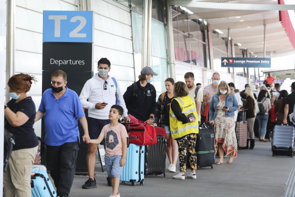 A queue at Sydney Airport’s T2 terminal on Thursday morning.