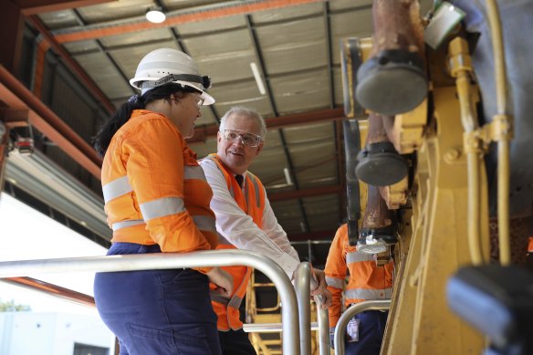 Prime Minister Scott Morrison and BHP apprentice Olivia Lodding at the BHP Future Fit academy in Perth on Wednesday.