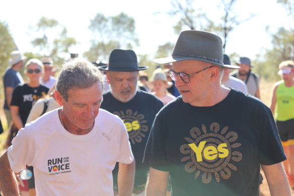 Prime Minister Anthony Albanese meets Pat Farmer as the former Liberal MP and ultra-marathon runner finishes his nearly 14,000 km Run for the Voice at Uluru.