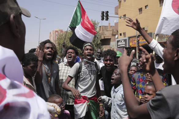 Sudanese anti-coup protesters take part in ongoing demonstrations against the military rule in Khartoum, Sudan, on Monday.