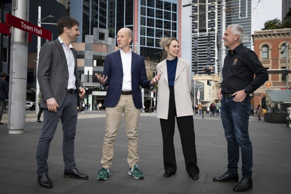 After years of animosity, executives from Uber and officials from the TWU put on a display of bonhomie in Sydney on Tuesday. From left, union assistant secretary Nick McIntosh, Uber Australia boss Dom Taylor, Uber Eats’ local head Bec Nyst, and union national secretary Michael Kaine.