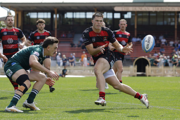 Henry O’Donnell passes the ball for Norths in their semi-final win over Randwick.