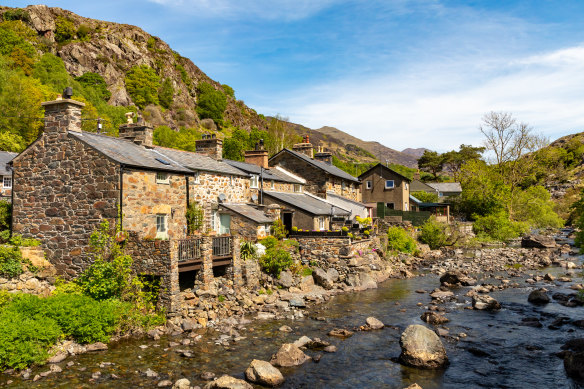 Stone buildings beside the river Glaslyn, in Beddgelert, in Snowdonia National Park.