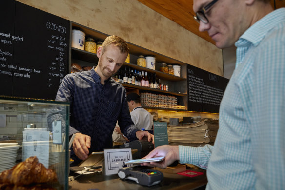 Cafe manager Chris Tate has reaped the benefits of turning his business 
into a cashless operation.