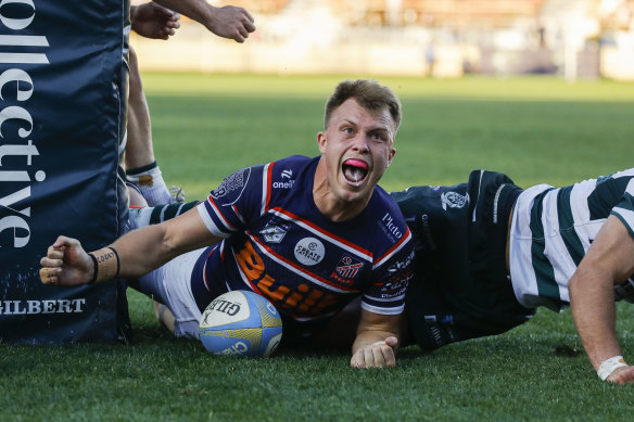 Easts winger Darby Lancaster celebrates his match-winning try.