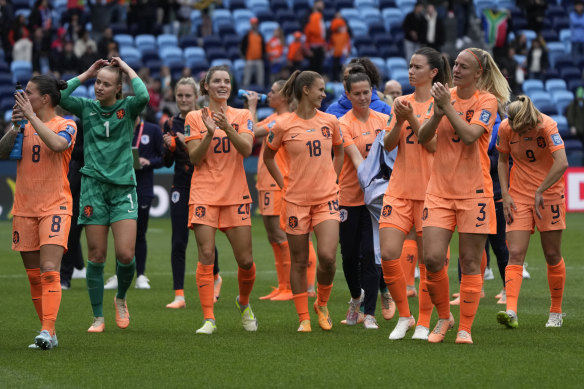 The victorious Dutch salute their supporters following their 2-0 win over South Africa at the Sydney Football Stadium.