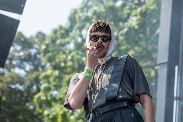 Haden on stage with Model/Actriz at Pitchfork Music Festival last July. His confrontational performance style is influenced by Marina Abramović.