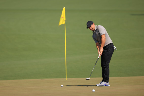 Rory McIlroy gets in some practice on the second green at Augusta.
