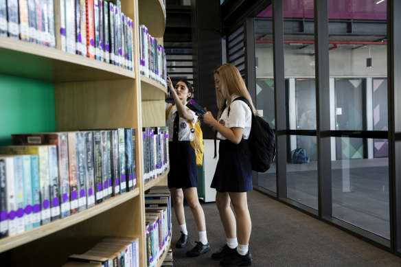 Students look at books outside an ‘iHub’ at Arthur Phillip High School in Parramatta.