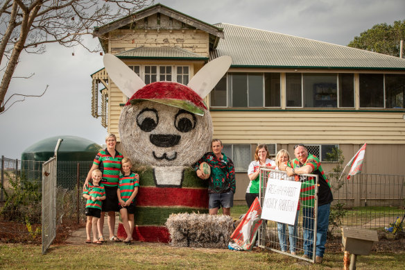 Souths fans the Skewes family have built a giant Reggie Rabbit in their front yard out of hay bales in Coulson west of Brisbane ahead of the NRL grand final this weekend. 