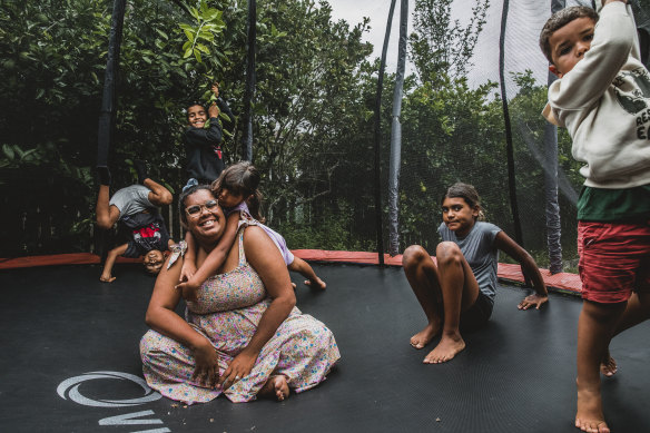 Portia Walker-Fernando from Casino, pictured with her children, believes that culturally informed healing programs are crucial to improving rates of mental illness among Indigenous Australians.