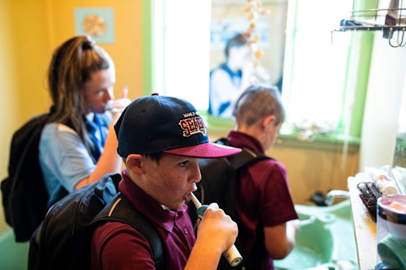 Jordan brushes his teeth before school.