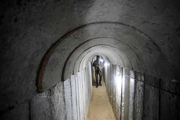 An armed guard inside one of the tunnels on the Gaza-Israeli border.