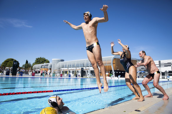 Water Polo players  Charlie Negus, Matt Sharp, Hayley Collins and Graham Wulf take a leap into the pool at the Ashfield Aquatic Centre.