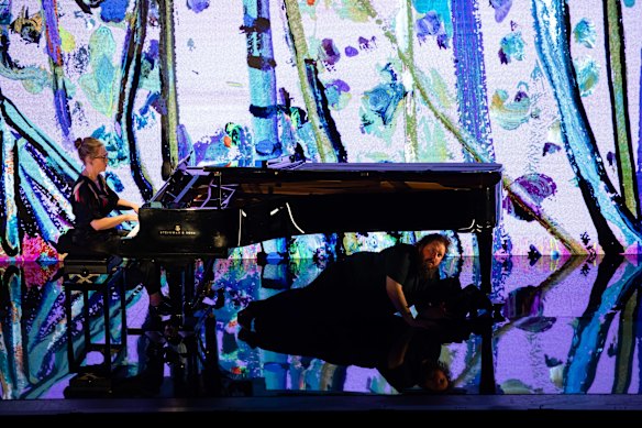 Allan Clayton moved around, behind and even beneath the piano played by Kate Golla.