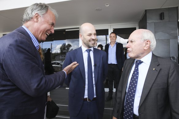 Liberal candidate for Bennelong Simon Kennedy (centre) campaigning with retiring MP John Alexander (left) and former Prime Minister John Howard.