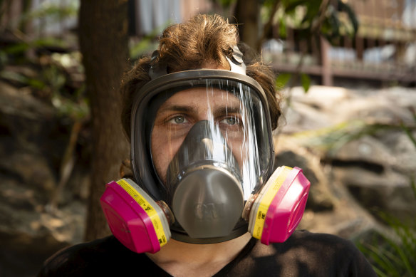 Adon Sammut, 28, from Menai has taken to wearing a P3 gas mask when outside on smoky days.