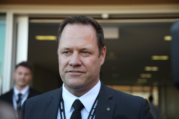 Detective Senior Sergeant Cameron Blaine at a press conference outside the Carnarvon Courthouse in November last year.