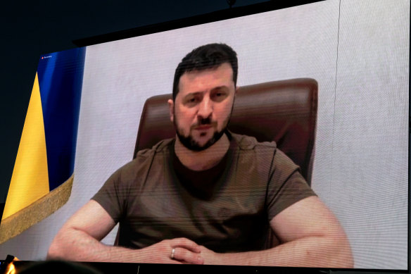 Ukrainian President Volodymyr Zelensky, pictured during a previous video appearance, addressed world leaders in Bali via videolink.
