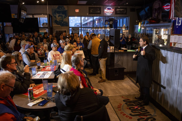 Ron DeSantis speaks during a campaign event at an Iowa pub yesterday.