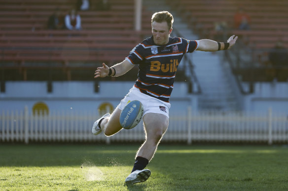 Waratahs five-eighth Jack Bowen clearing the ball for Easts.