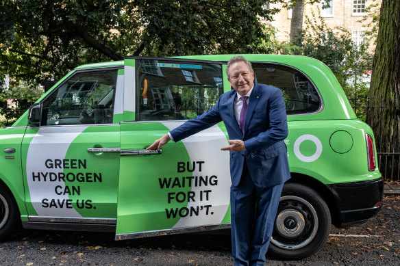 Fortescue boss Andrew ‘Twiggy’ Forrest with one of his climate campaign cabs in London.