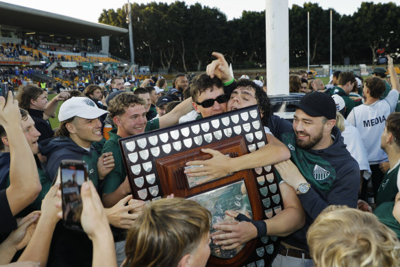 Randwick captain Ben Houston hugs the Shute Shield.