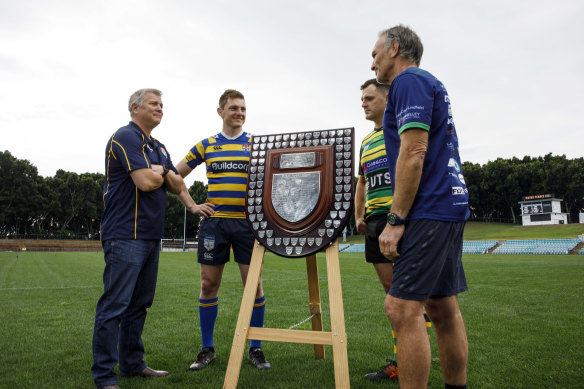 Sydney Uni’s Sean Hedger and Jack McCalman, and Gordon’s James Lough and Brian Melrose, pose with the Shute Shield.