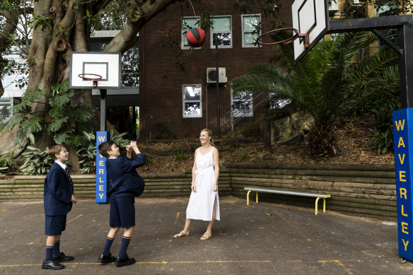 Jade Stapleton with her sons Axel in year 5 and Fox in year 7 at Waverley College.