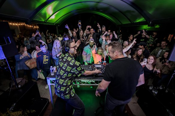 Moloney (in black T-shirt) was the guest DJ at the Ramsay St Rave on the Neighbours backlot. 
