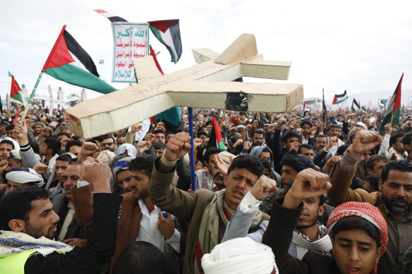 Houthi supporters rally against US-led airstrikes on Yemen and the Israeli offensive in the Gaza Strip.