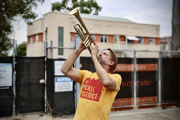 Pickle District founder Jon Denaro sounds the alarm outside the East Perth Power Station.