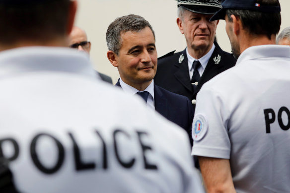 Interior Minister Gerald Darmanin, pictured with police officers in 2020, said last week that there were questions rape victims should not be asked when they file complaints. 