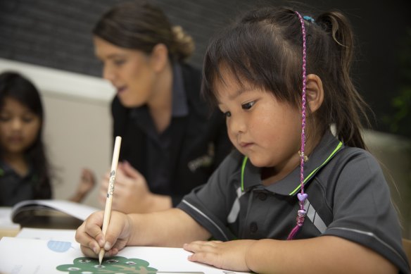 Sethuli Gunasekwra, 4, campus director Gemma Noake and Emma Chan, 4, at the Papilio Early Learning Centre in Artarmon, Sydney.