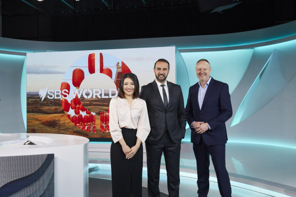 SBS Mandarin and Arabic newsreaders Rena Li and Ali Bahnasawy with managing director James Taylor.