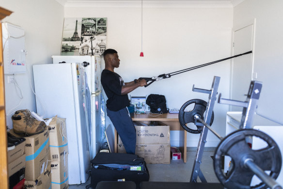 After Covid-19 shut his gym Cornelius shifted his work out into the family garage. 